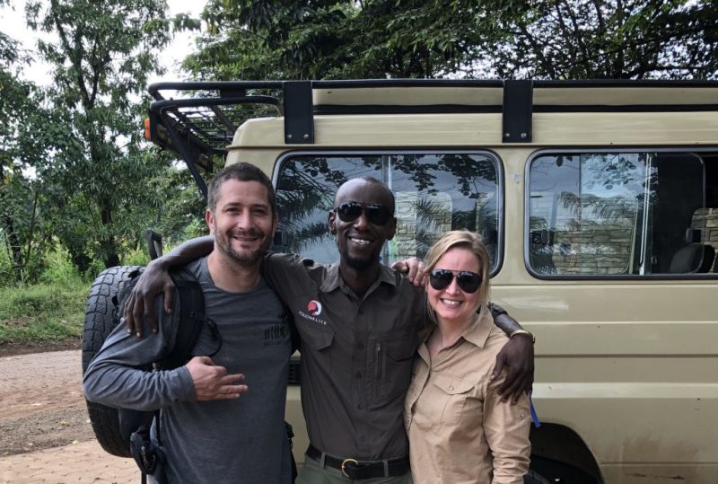 Kazi and clients by safari vehicle
