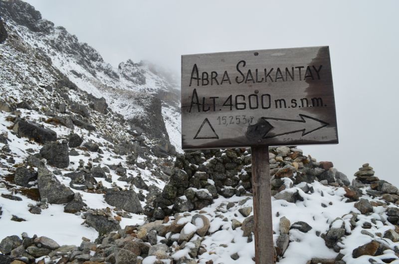 Sign to Abra Salkantay, or Salkantay Pass, snowy landscape, trek to Machu Picchu, Peru