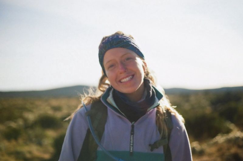  Smiling female hiker on Kilimanjaro, August 2022