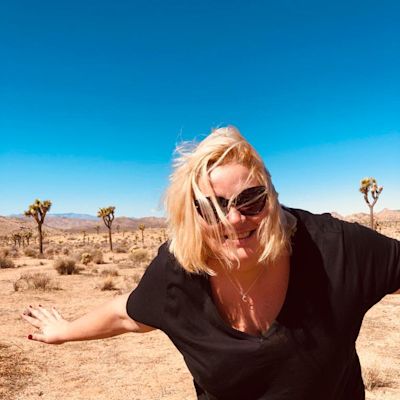 Lexy in sunglasses in the desert