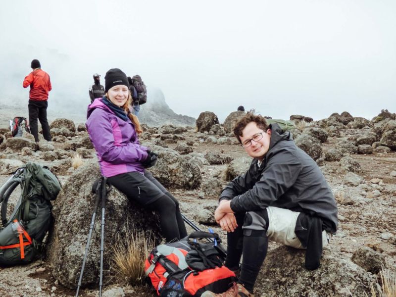 happy-mountain-climbers-taking-a-rest-on-Kilimanjaro-1-1024x768.jpg