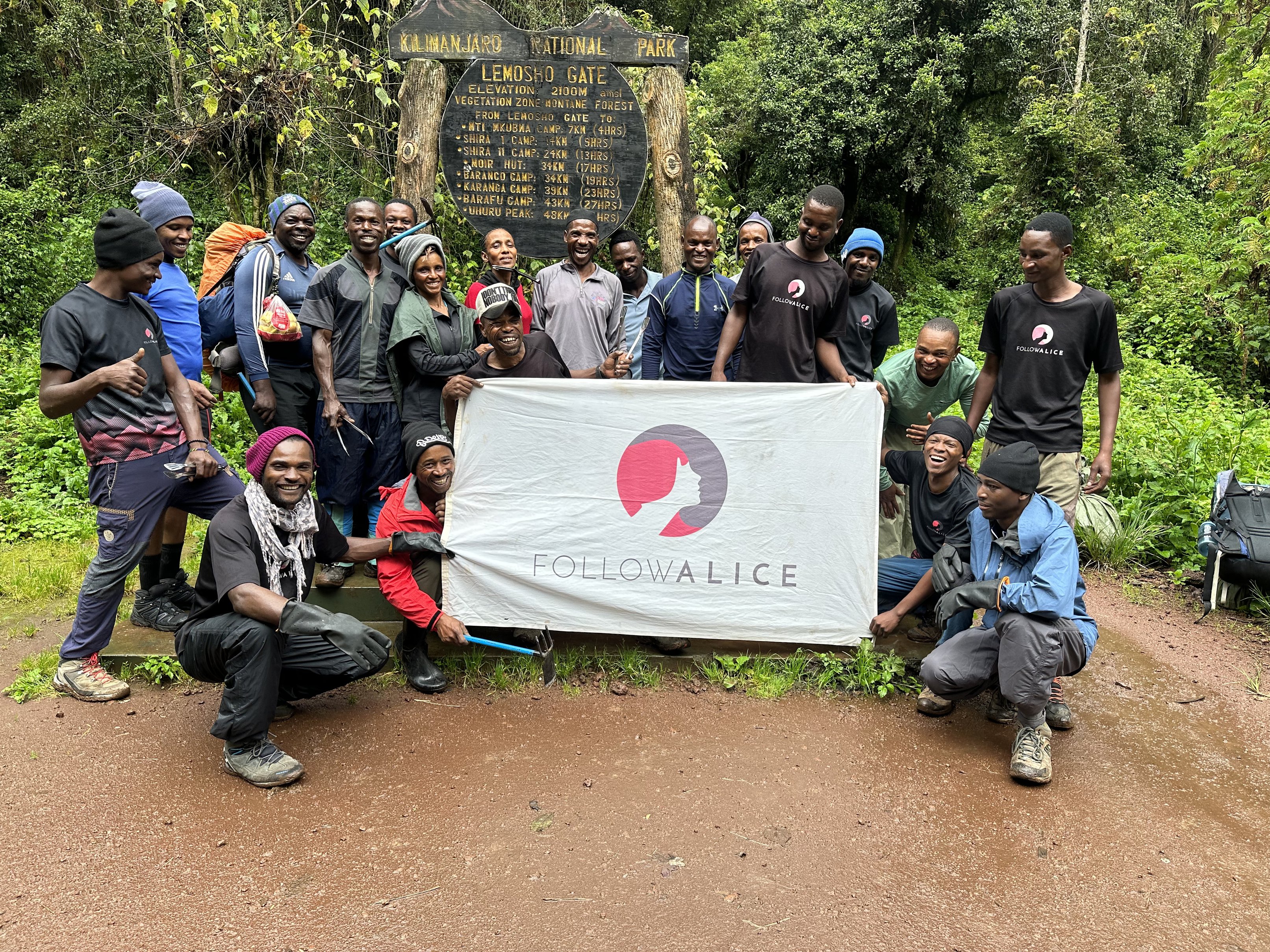 Kilimanjaro 2023 clean up Follow Alice crew in rainforest group photo