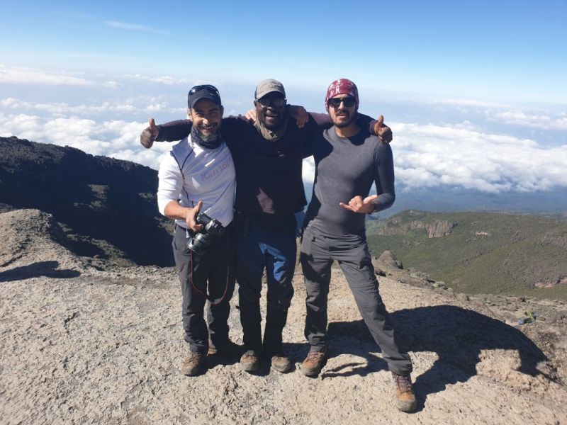 Smiling trekkers on Kilimanjaro
