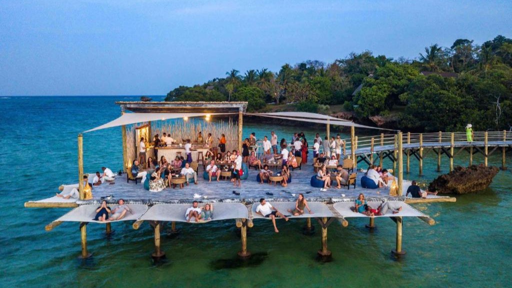 The Sands at Chale Island pier people