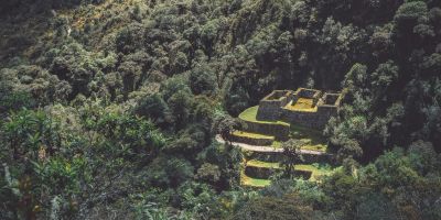 An ancient Inca ruin hidden in the forest, view from the Inca Trail (Peru)