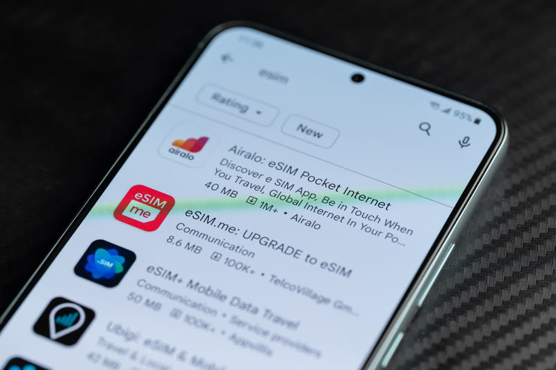 eSIM apps on a smartphone screen