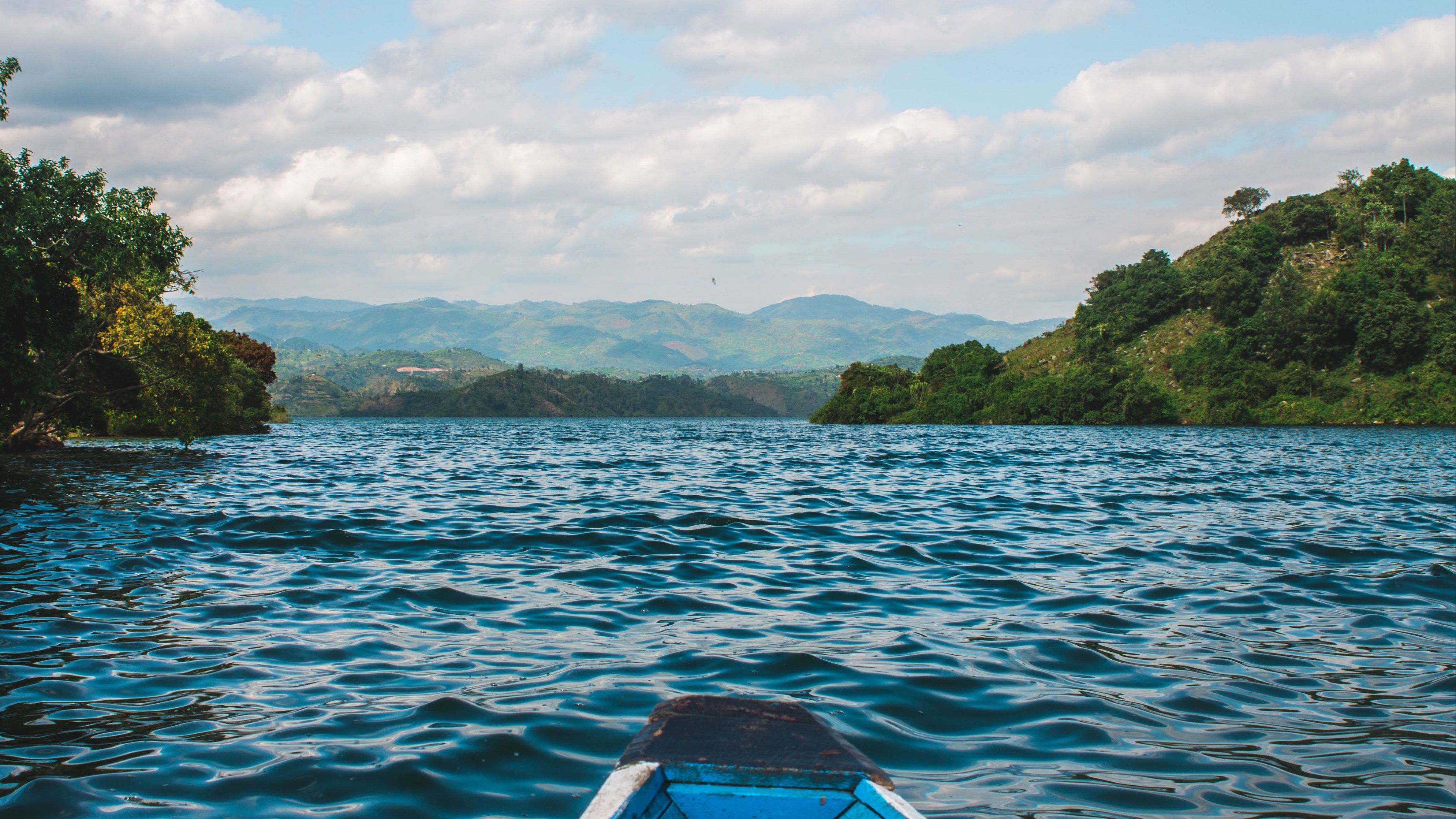 Ours. L. Boat or canoe view on Kivu Lake Rwanda