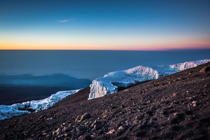 Sunrise view of a gorgeous glacier from the top of Kilimanjaro