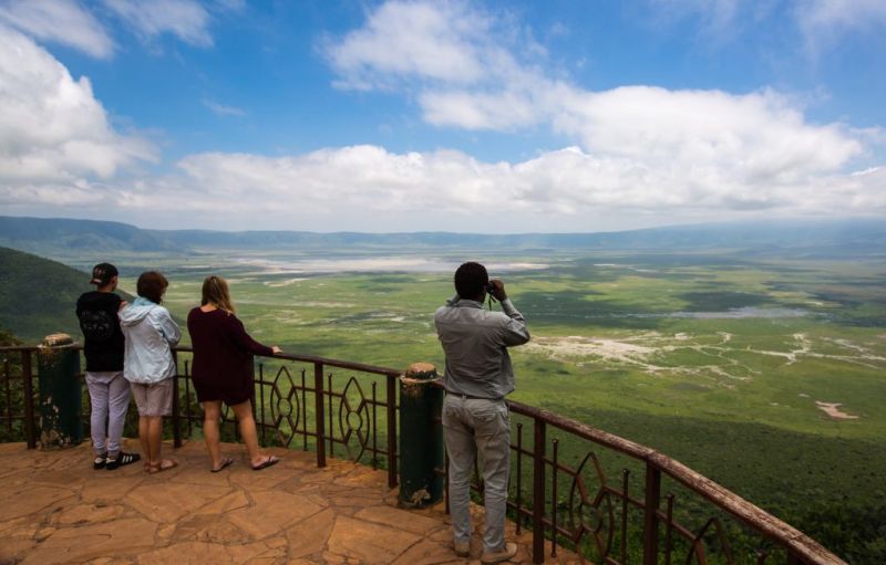People on balcony overlooking Ngorongoro Crater in the wet season