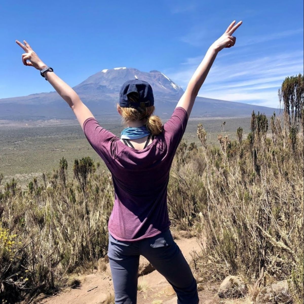 female hiker in front of Kilimanjaro