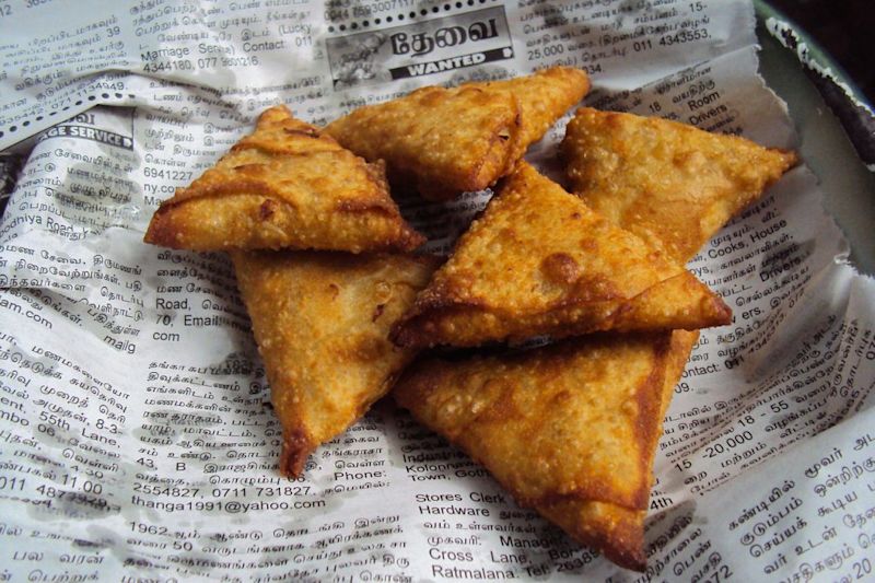 Samosas in newspaper