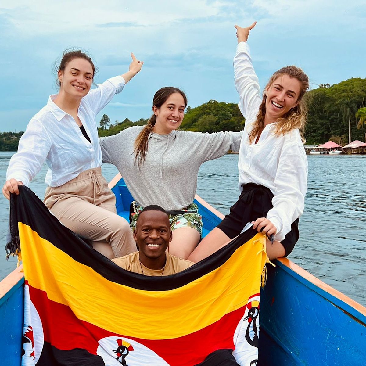 Elena, Beatriz & Sophie with guide Simon in Uganda boat ride on Nile River near Jinja