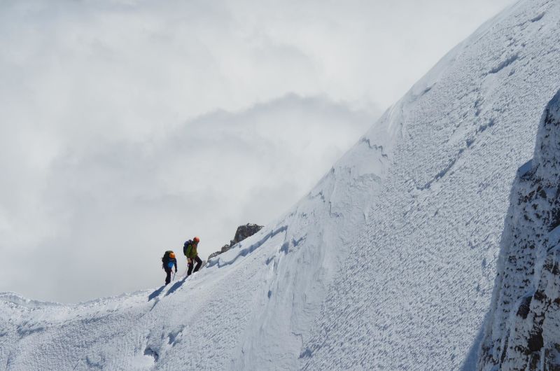 Mont Blanc climbers on steep ridge 