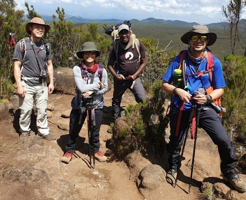 Kilimanjaro smiling trekkers moorland, train for Kilimanjaro