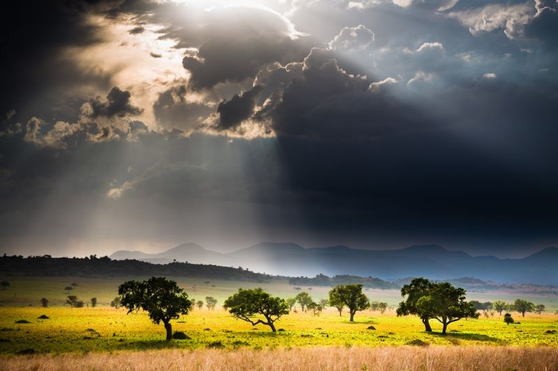 Storm clouds and sun rays over Kidepo Valley National Park in Uganda