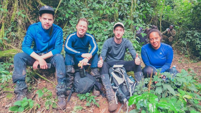 Gorilla trek group smiling