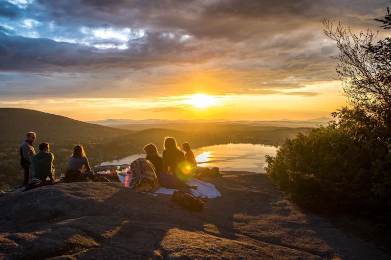 sunset group photo on a hike