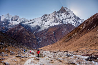Kangtega mountain and trekkers in Khumbu region