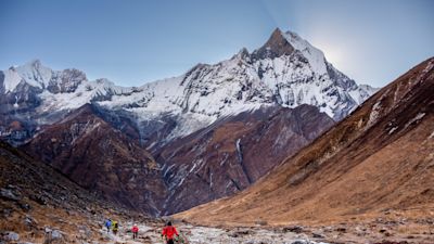 Kangtega mountain and trekkers in Khumbu region
