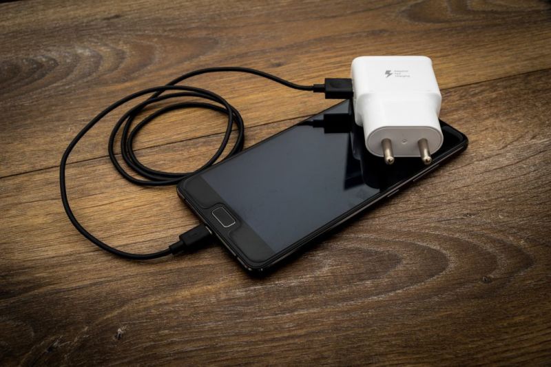 Smartphone and charger and two-pin plug