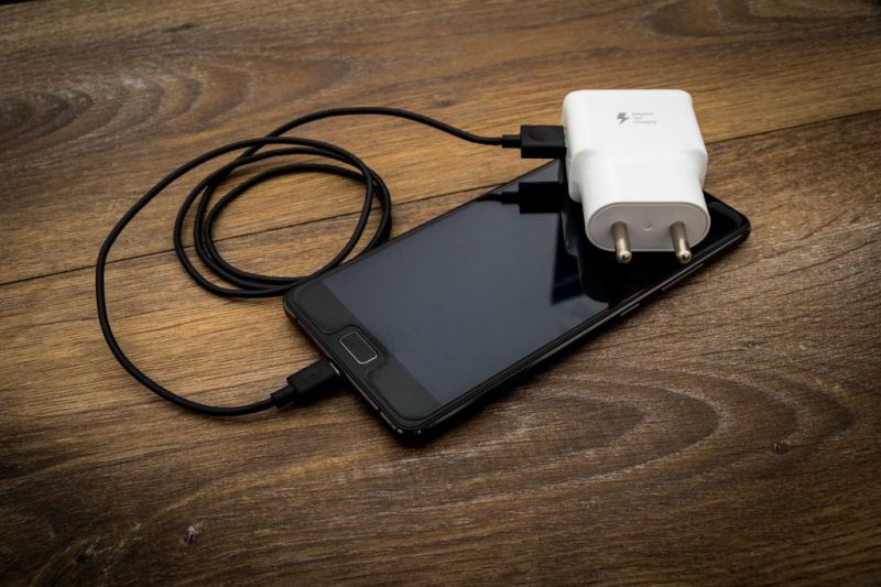 Smartphone and charger and two-pin plug