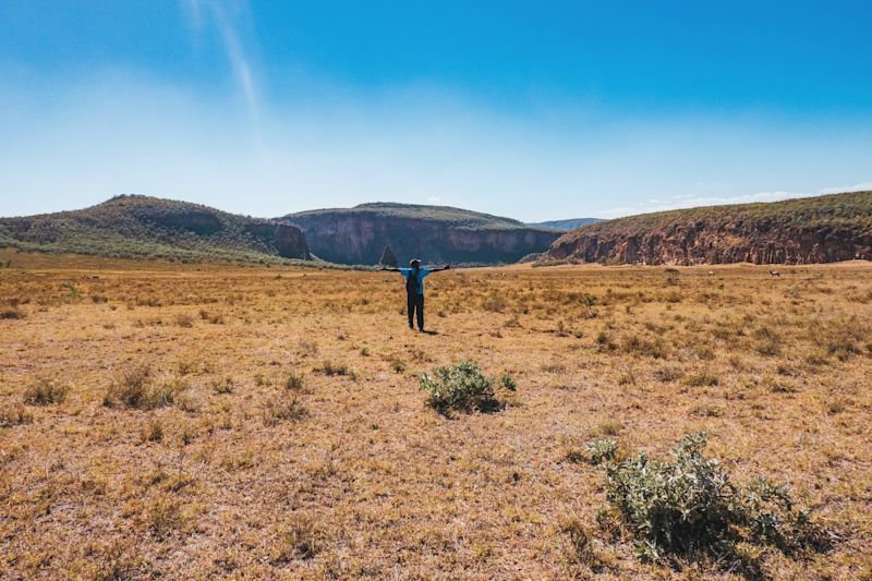 Male hiker in Hell's Gate National Park, Kenya, in the dry season