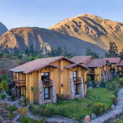 Tierra Viva Sacred Valley exterior view with gardens and mountains, Peru accommodation