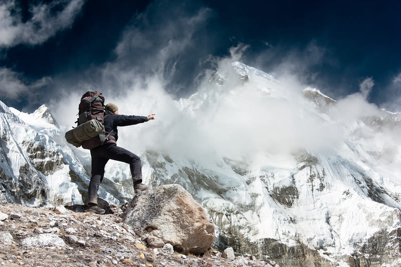 Trekker pointing to Mount Cho Oyu, EBC and Gokyo Lakes trek, Nepal