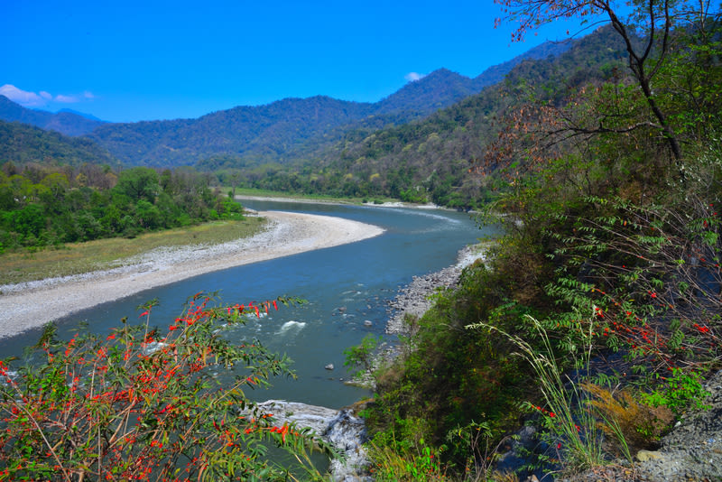 Manas River flows from Bhutan into India