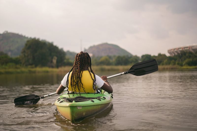 Black woman kayaking nature