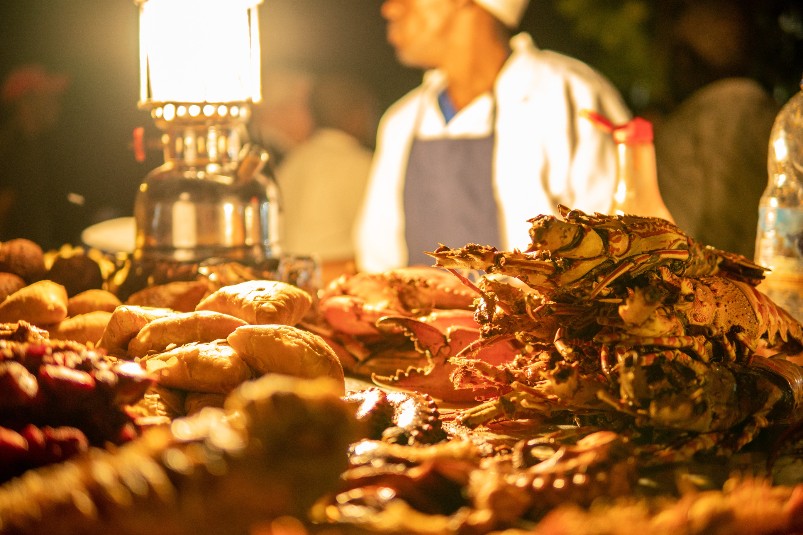 Zanzibari night street food market in Forodhani Gardens. Stone Town, Zanzibar City, Unguja island, Tanzania.
