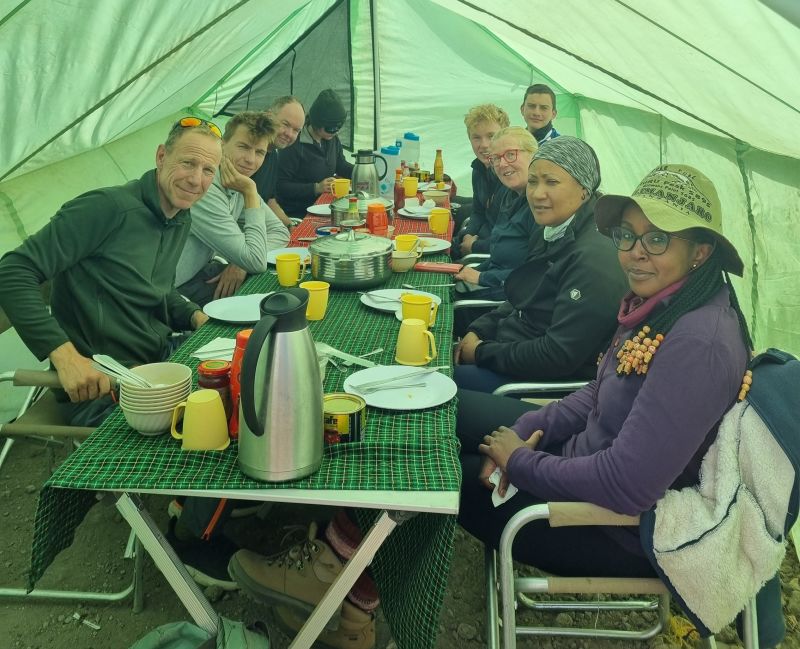 Group pic in the Follow Alice mess tent at Barafu Camp