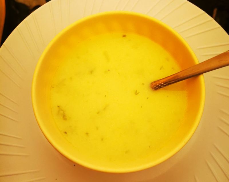 Bowl of soup with a spoon