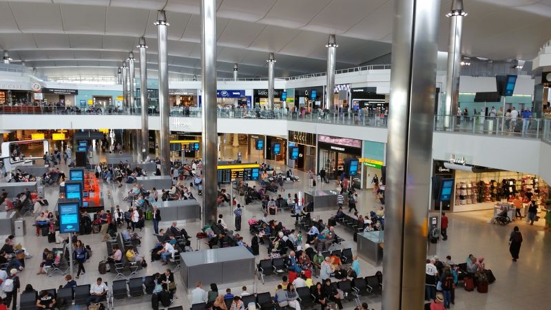 Crowded Heathrow Airport terminal