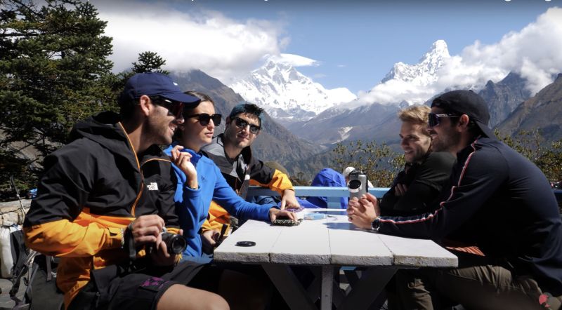Trekkers sitting at a table on the terrace of Hotel Everest View on the EBC trek, Nepal