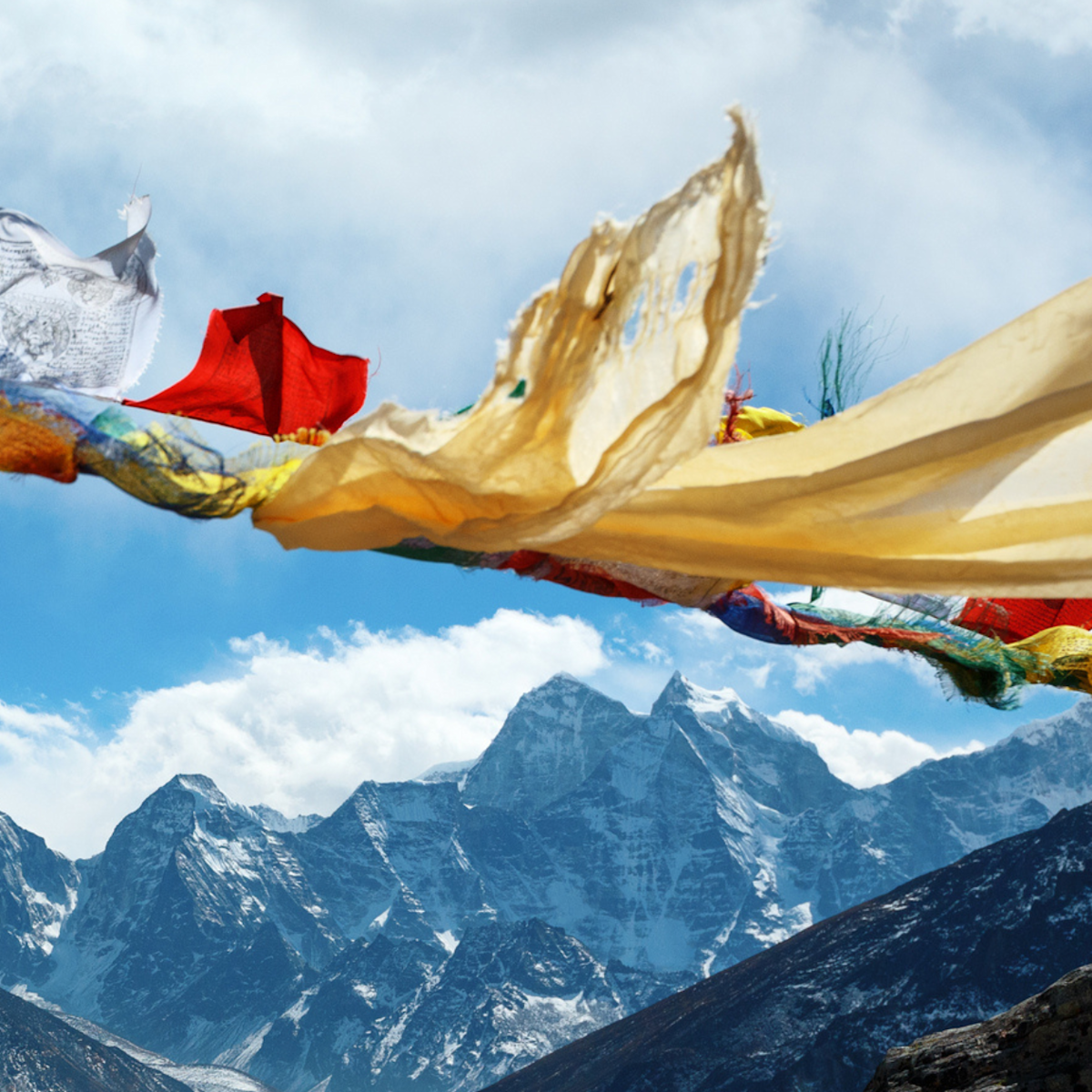 Sonam. View from under fluttering prayer flags on EBC trek in Nepal