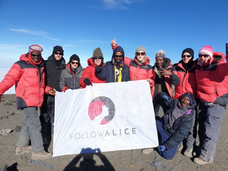 Follow Alice summit team photo Kilimanjaro