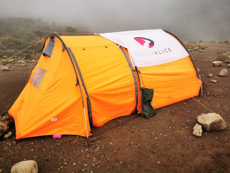 Orange Follow Alice sleeping tent on Kilimanjaro in the mist