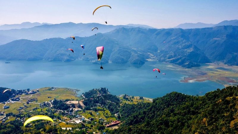Paragliders over Phewa Lake and Pokhara, Nepal, Annapurna Circuit route