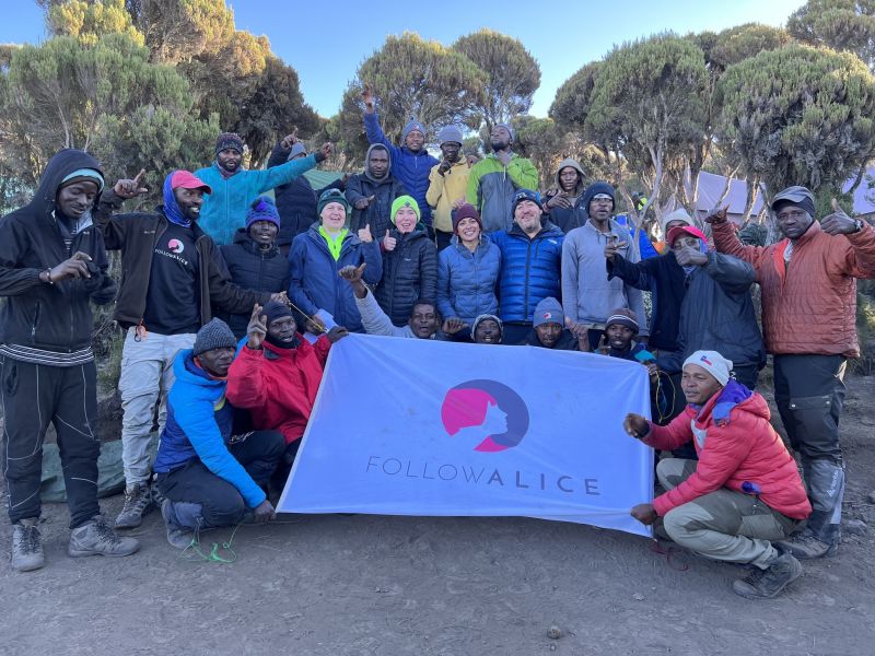 Group pic of Follow Alice climb group on Kilimanjaro, August 2022