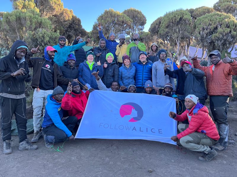 Group pic of Follow Alice climb group on Kilimanjaro, August 2022