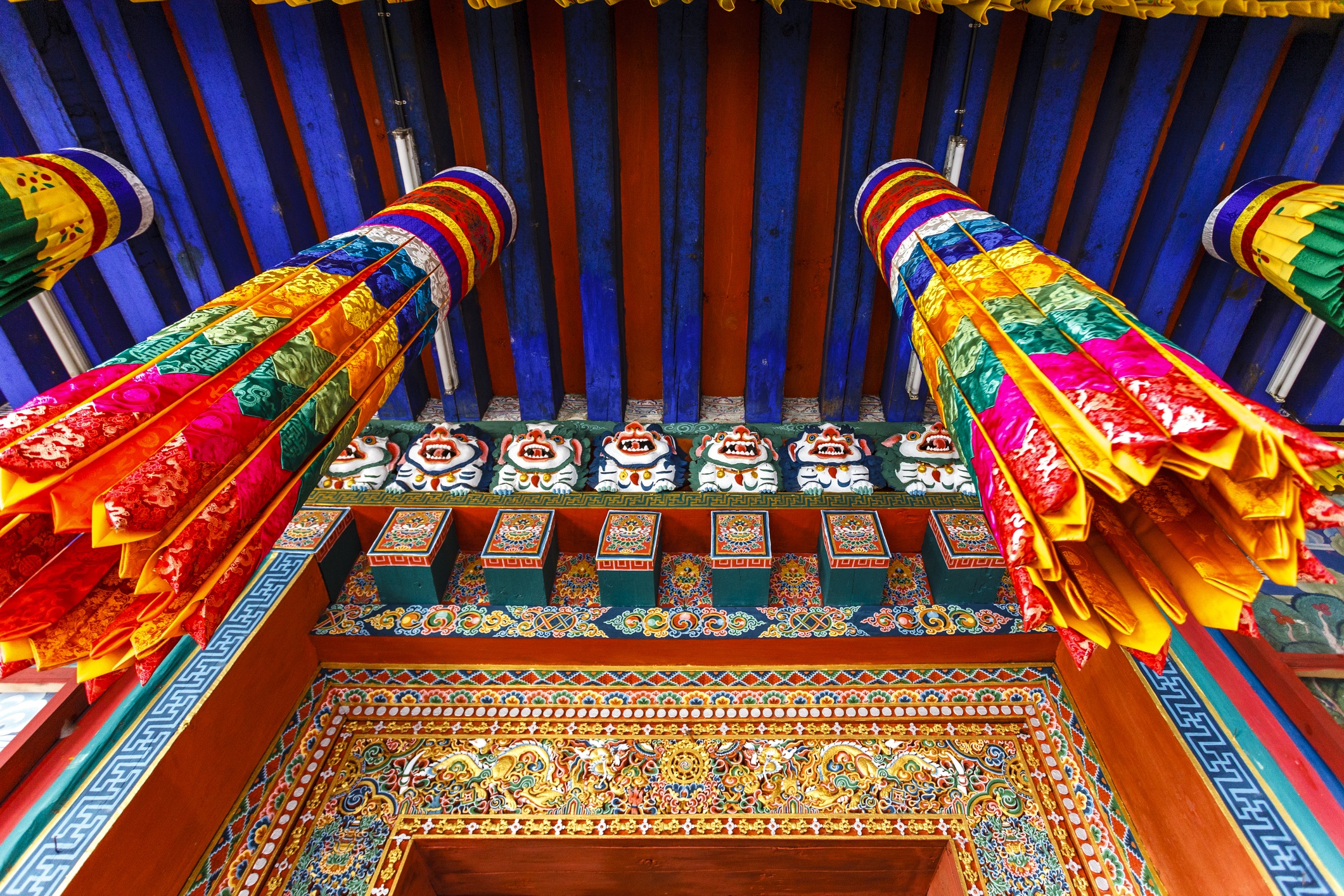 Ornate gate inside of Rinpun Dzong monastery in Paro, Bhutan