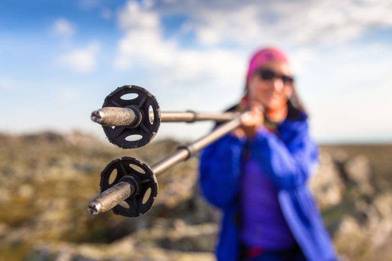 Close up of baskets and tips of trekking poles