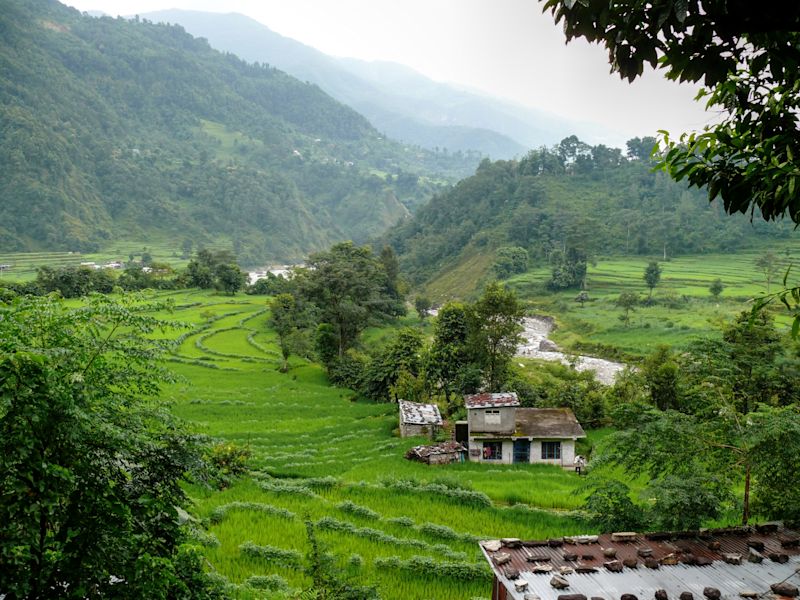 Fringe of a town Besisahar in Nepal Annapurna Circuit, springtime fields