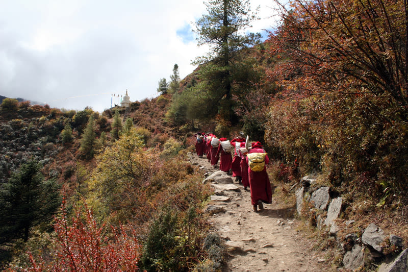 Sherpa ladies carrying potatoes to Namche Bazaar on EBC trek route