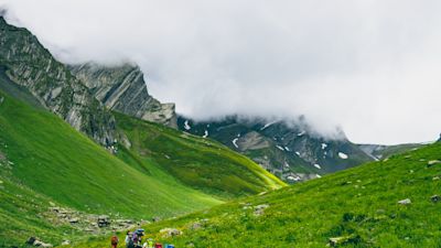 Hikers friends sunset mountains