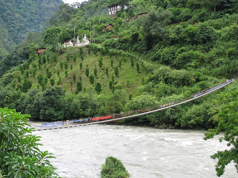 suspension bridge across the Kuri Chhu River near Lhuentse Dzong Bhutan