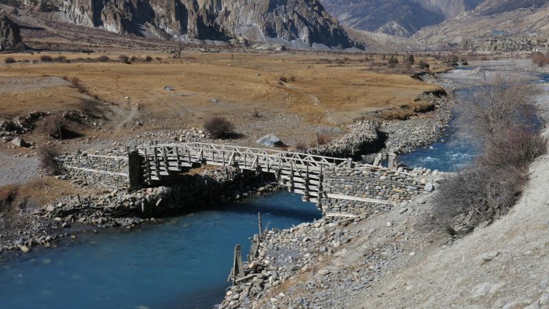 Traditional timber bridge in Manang. Annapurna Conservation Area, Nepal.