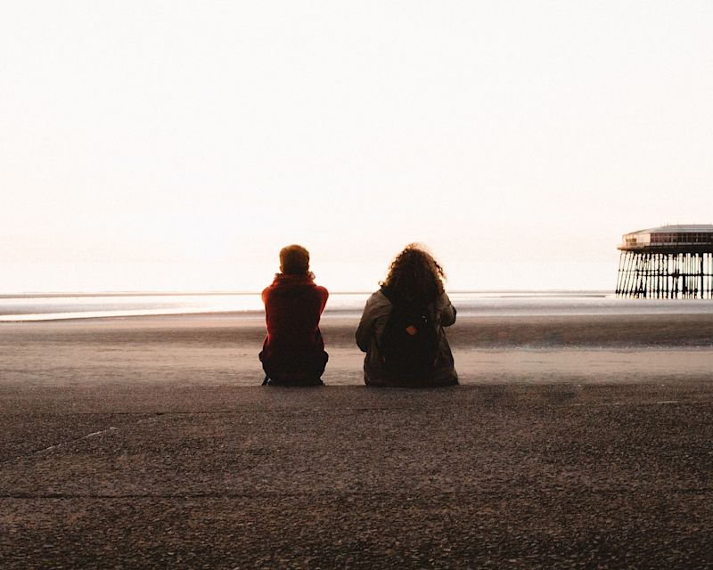 couple sitting on beach