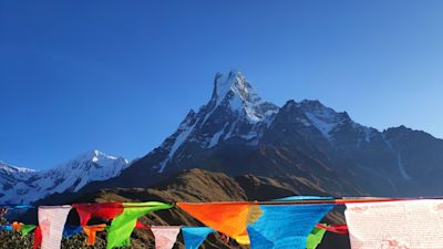 Mardi Himal Base Camp with prayer flags, Lumle, Nepal